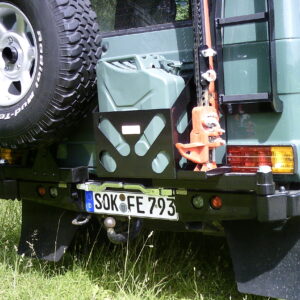 Rear bumper with fuel kit with high lift, tire carrier and ladder.